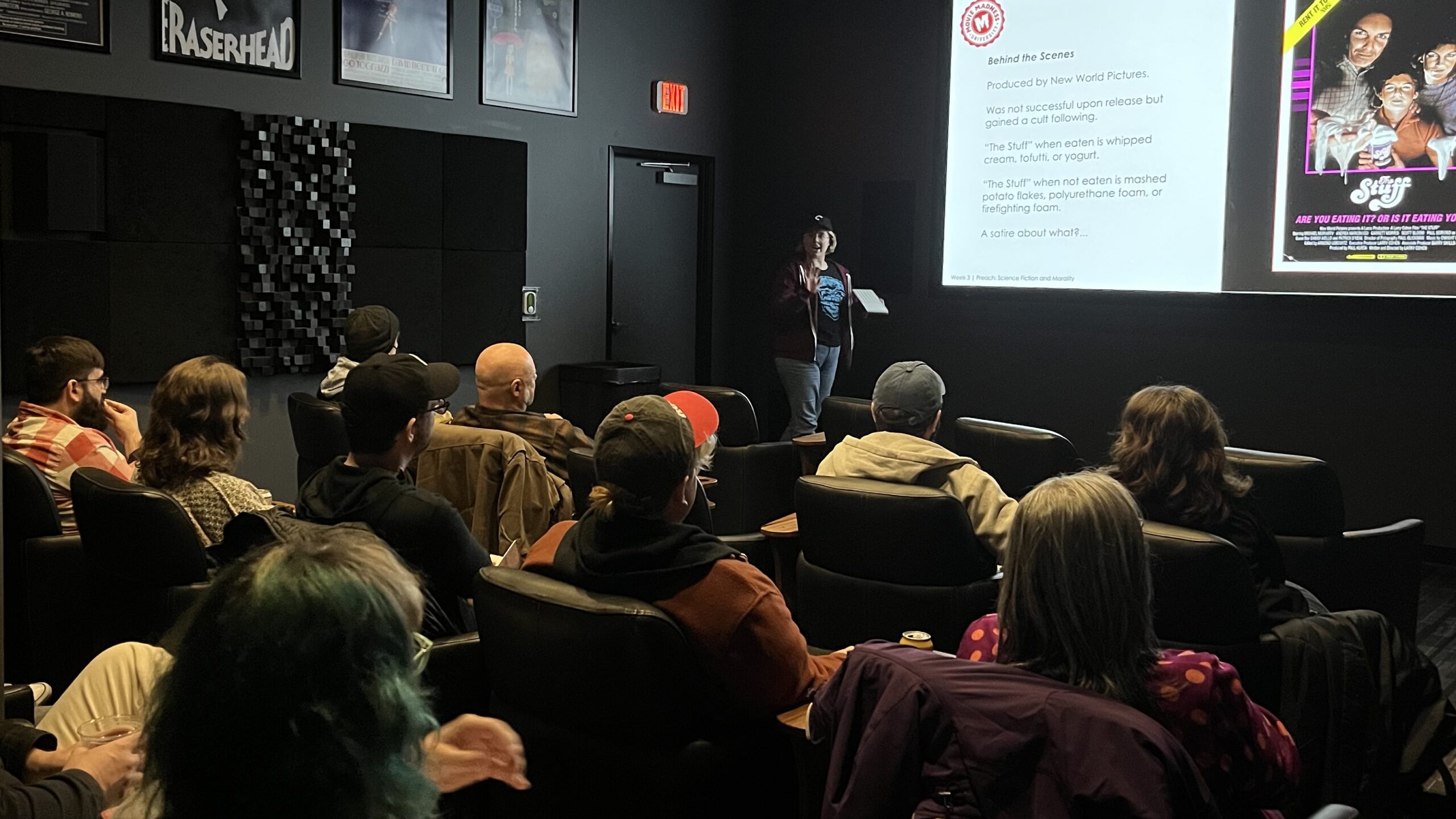 A full class in the Movie Madness miniplex learning behind the scenes information about the movie 'The Stuff'.